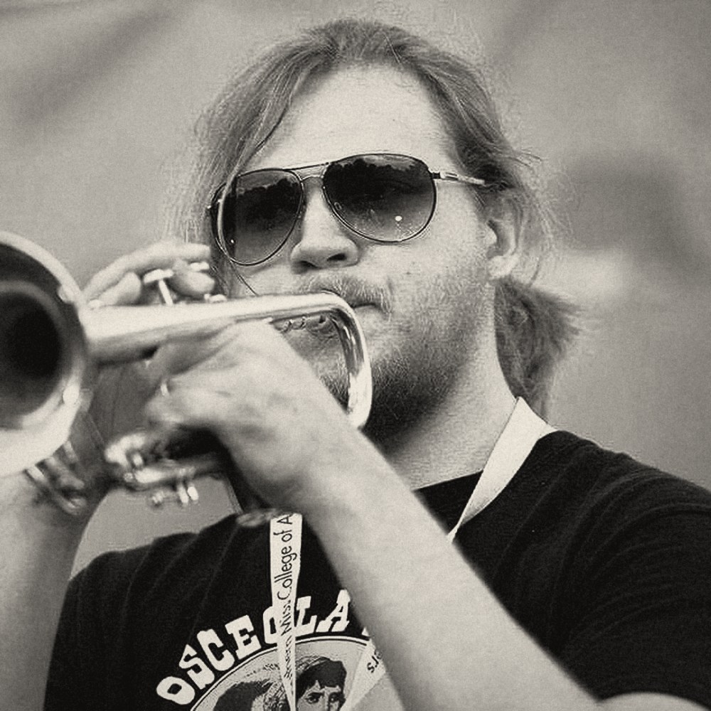 Colman Grinell playing trumpet